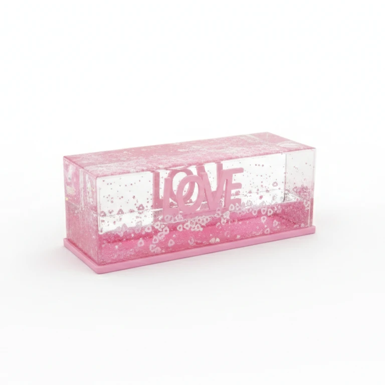 liquid-filled decorative object with a "LOVE" inscription and pink glitter inside.
